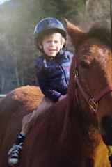 My oldest son riding my Mustang mare bareback at age 3
