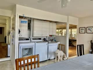 Washer/dryer and dishwasher.  Larger table for bigger groups to eat, puzzles, projects