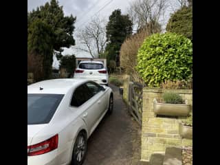 Driveway can fit two cars easily.