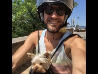 Filippo on his scooter in summer with our Tony.