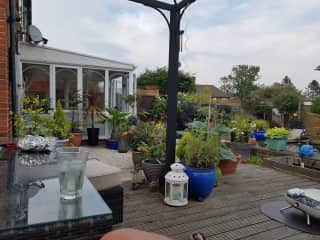 We live in a 3 bed semi detached on a small estate in Weybourne.  We have a Lovely garden with seating area , mixture of decking, patio and grass plus a large koi pond.