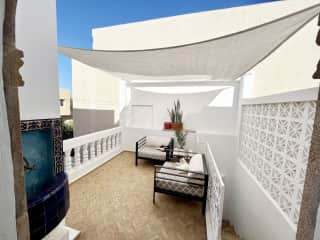 Terrace off of the Master bedroom. The stairway on the right leads to the patio downstairs.