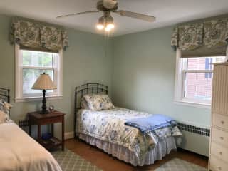 Guest bedroom upstairs: two twin beds, a desk, closet space and drawers for your clothes.