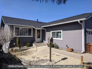 Front of house. To the right (out of frame) is our driveway with space for 2 cars.