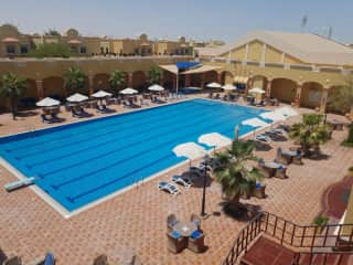 Olympic size pool (always clean and fresh) and shade adjacent to Clubhouse.