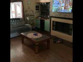 Great room with bar and TV