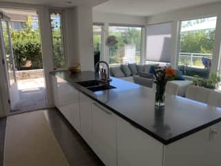 Open kitchen with outside access to a shared courtyard