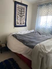 Bedroom with queen bed.