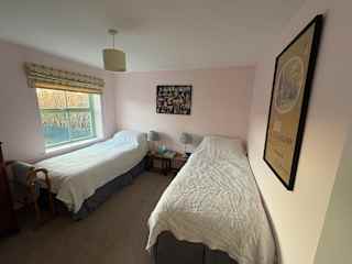 Sitters room that can be a twin or made into a king sized bedroom. Has a chest of drawers for clothes storage