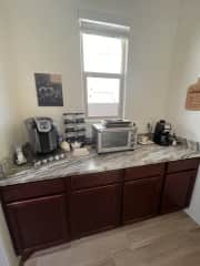 Butler Bar off the kitchen with toaster oven Keurig coffer and cappuccino machines