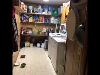 Laundry room/Pantry. Susie has her food and water here.