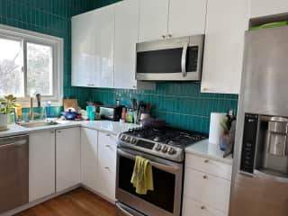 Kitchen. Dishwasher, 5 burner stove/oven, Microwave and side by side fridge freezer with water and ice dispensers. Beverage/wine fridge in kitchen island