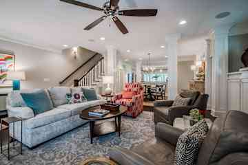 Open floor plan on the main level, with the living room extending to dining room and kitchen.