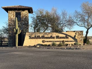 Beautiful guarded entry gate into our gated secure