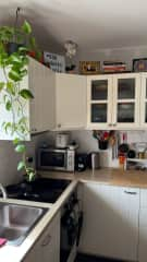 Fully equipped kitchen with microwave, coffee machine, toaster and all cooking essentials