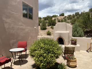 Front outdoor patio with fireplace.