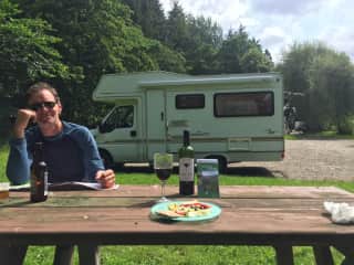 Happy camper taking a break while exploring the Scottish Borders