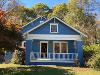 Great front porch, as well as large back deck with gas grill overlooking fenced in yard.