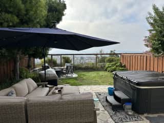 Hottub, fire pit & lounge area