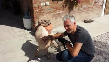 Nicolo with pet goat in Reggio Emilia, Italy