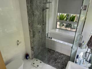 En suite with shower and bath