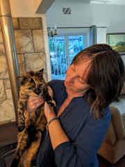 Hilary with the Ozy (Ozymandius)--the oldest, grumpiest, most adorable rescue cat