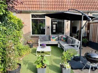 This is our garden in the summer/spring. We unfortunately pack the outdoor furniture away in the winter months.