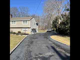 View from road. 1 acre lot to relax in!