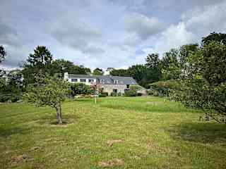 Our property from the bottom of the field.  Plenty of space to play for sure
