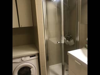 Small shower and washing machine.  There is no dryer.
