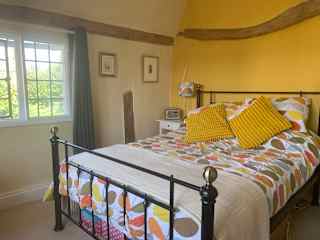 Guest room overlooking garden and road
