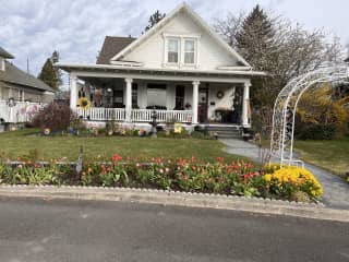 This is my home with Spring flowers in bloom.  I enjoy gardening so I have lots of flowers Spring through Fall.