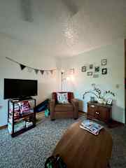 Living room with boardgames and TV