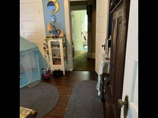 You need to walk through the other bedroom to get from your room to the bathroom/laundry room.
