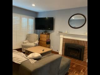 Living room with gas fireplace - very cozy and heats the house up quickly