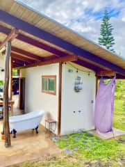 Bathhouse with clawfoot tub.