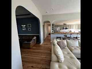 Open concept living area, TV room, and kitchen