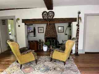 Open fireplace for winter log fires.