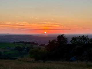 Looking across Cheshire towards Wales from Teggs Nose at Sunset