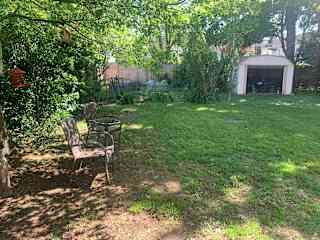 Shady and warm in spacious back yard