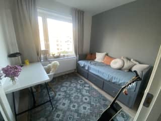 the guest room that also has an office desk