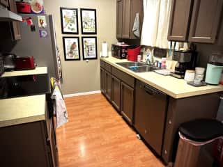 Galley-style kitchen with all the amenities though limited counter space.