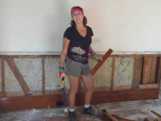 Tearing out beadboard from an 1892 house before demolition