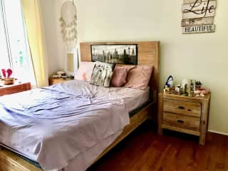 Bedroom with queens bed.