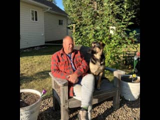 Luna & Bruce front of cottage.