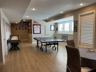 Basement: ping-pong table and shuffleboard table.