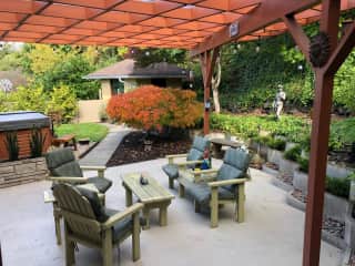 Back yard with covered patio and hot tub
