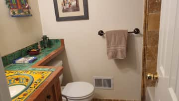 Full bathroom across the hall from guest bedroom