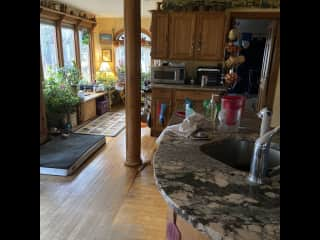 Lovely large Kitchen with dining table and southern exposure.