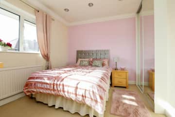 Your bedroom is bright and sunny. Situated at the back of the house